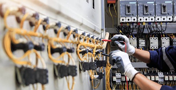 Professional Electrician technician working in Lake City, GA
